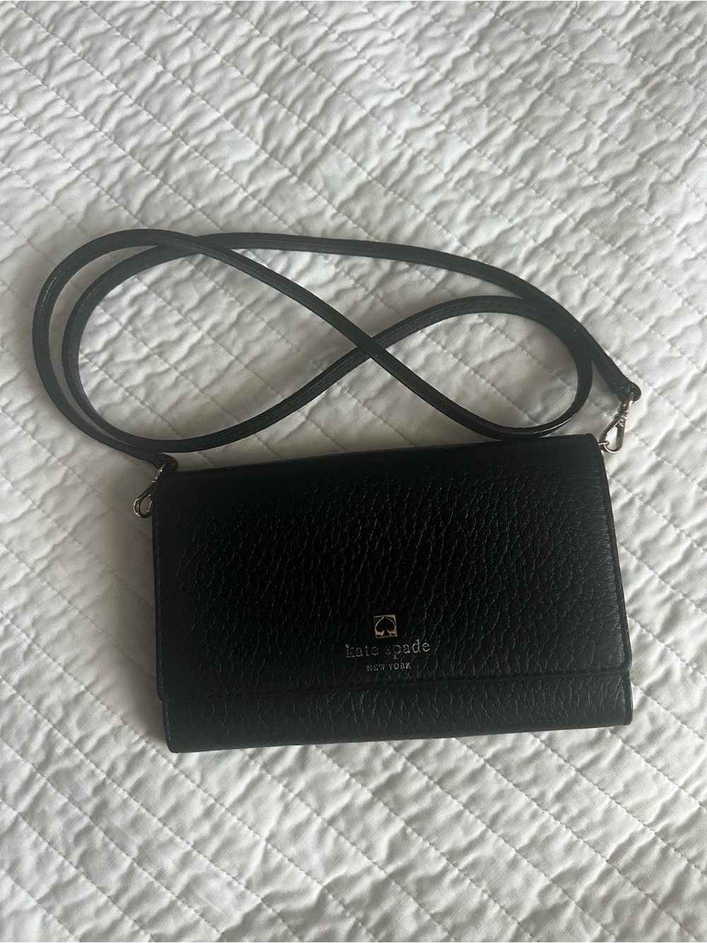 kate spade black leather crossbody bag with gold logo